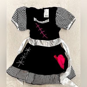 Broken doll child’s dress up, costume.